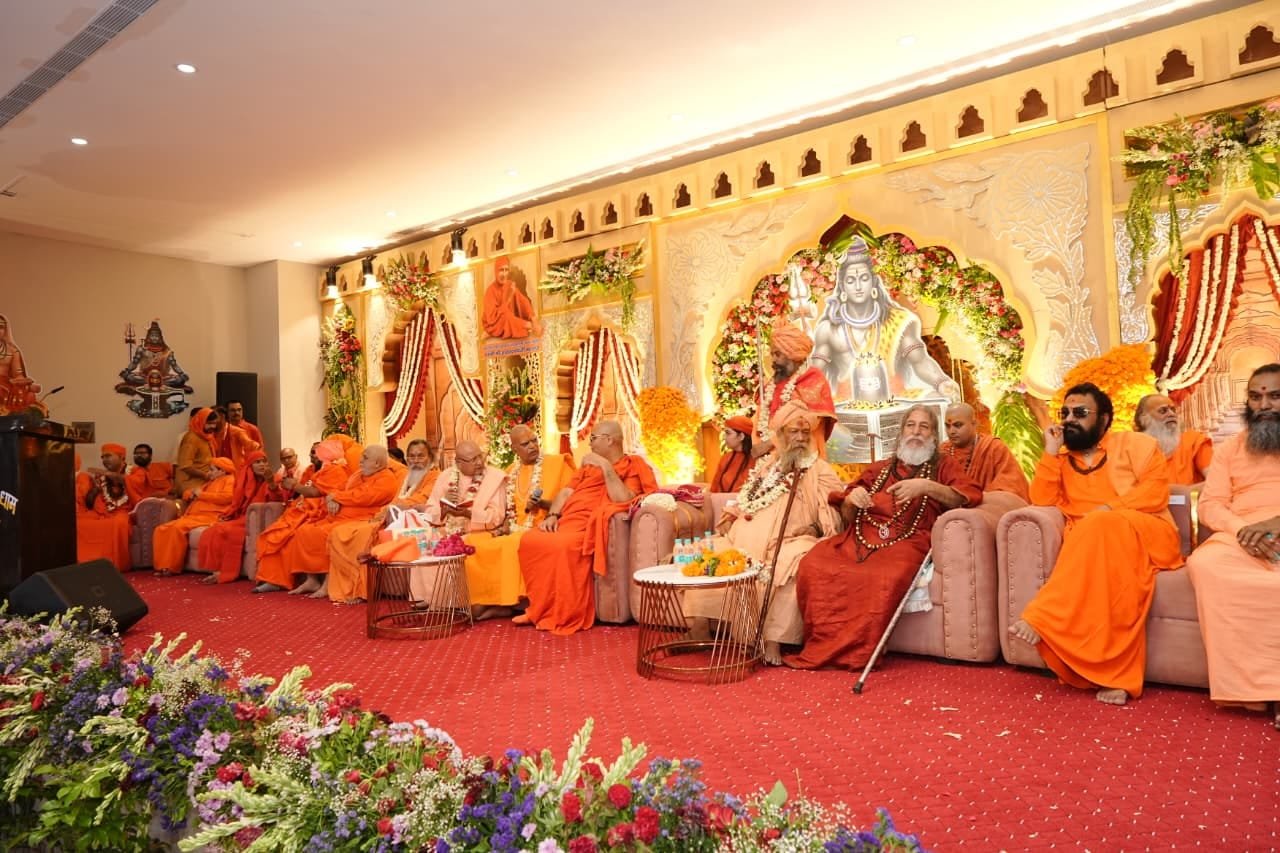 Saints gathered on stage during the Guru Purnima Mahotsav